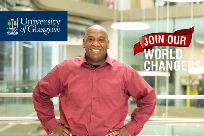 JMS Scholar Leslie wearing a red shirt and standing in one of the University buildings. The banner in the image reads 'Join our World Changers'.