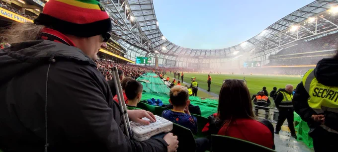 Bohs fan Declan Meenagh using the field of vision device during the game.