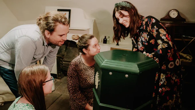 A photo showing a group of people in the Commandery Quest escape room at The Commandery.