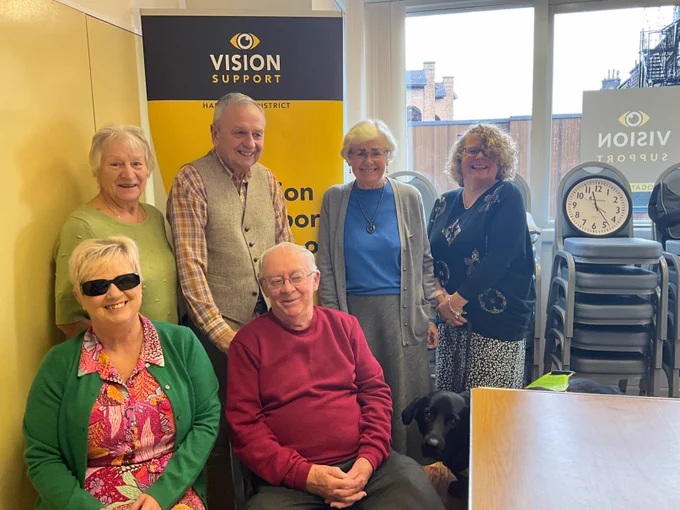 Some of our Tuesday volunteers with member Kim delighted at receiving their award