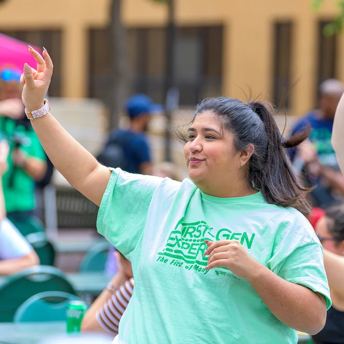 Member of the First Generation Success Center at a tabling event.