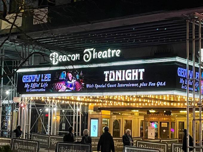 The facade of the Beacon Theatre with the name in neon lights and the marquis advertising: Geddy Lee My Effin' Life in Conversation / Tonight / with special guest interviewer plus fan Q&A. 