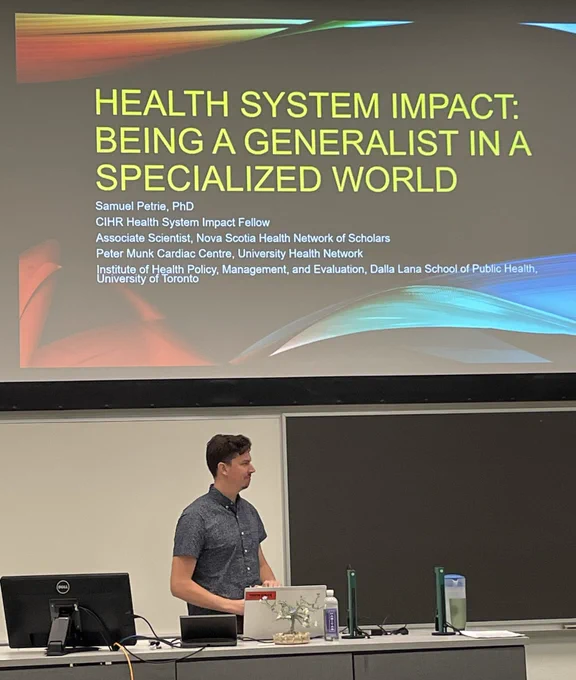 PowerPoint slide with presentation title, “Health System Impact: Being a Generalist in a Specialized World” by Sam Petrie, PhD