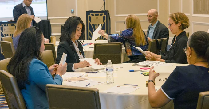Spouses of U.S. service members participate in an icebreaker as a part of the Marine Corps Support Facility New Orleans, Spouse Orientation 2023, at the Higgins Hotel, New Orleans, Oct. 20, 2023. The spouses attended briefs given throughout the weekend focusing on the facility, upcoming events, benefits, the surrounding area, and how they can become involved and help with family readiness. This was the first iteration of this orientation and more will be scheduled throughout the following years. (U.S. Marine Corps photo by Lance Cpl. Sarah Pysher)