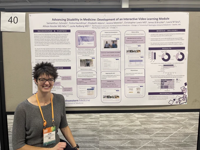 Woman with short black hair presenting a poster titled, Advancing Disability in Medicine: Development of an Interactive Video Learning Module. 