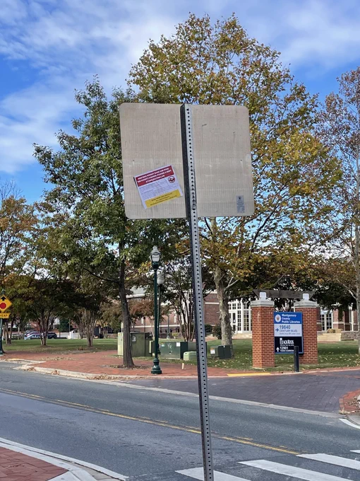 Rent stabilization poster on a sign