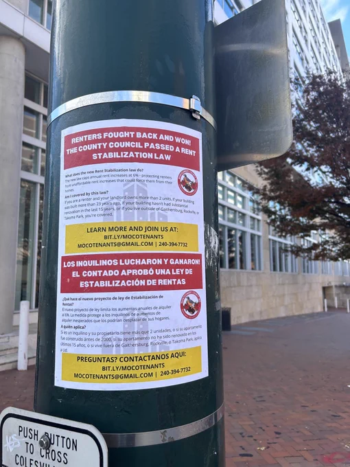 Rent stabilization poster on a pole