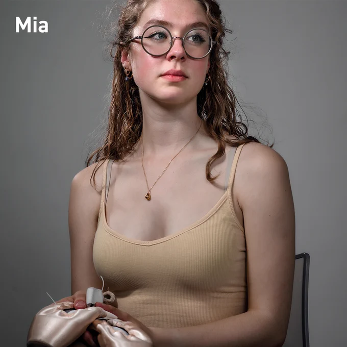 Biomedical engineer holding her ballet shoes