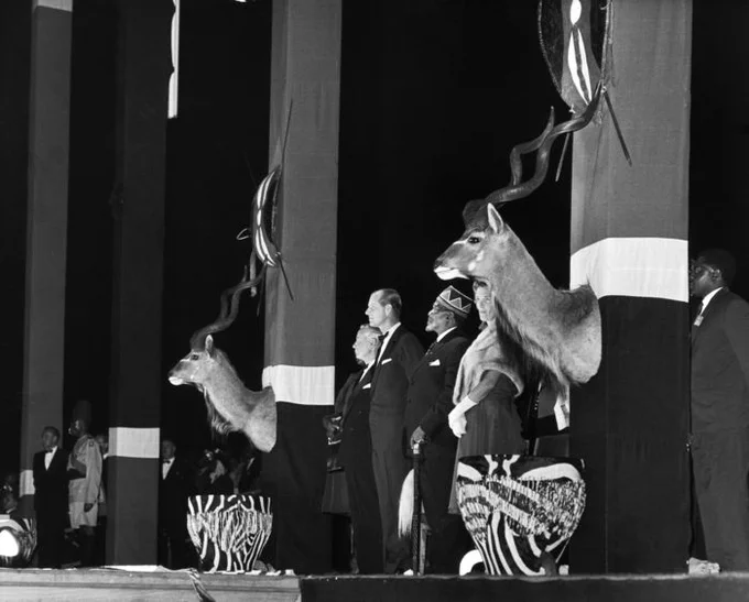 Kenyan Prime Minister Jomo Kenyatta with Prince Philip on a stage at independence ceremony in 1963