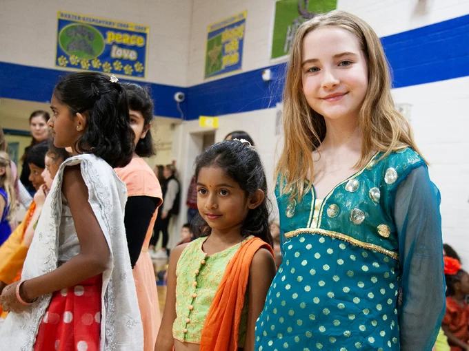 A Rockwood student smiles at her school's International Night.