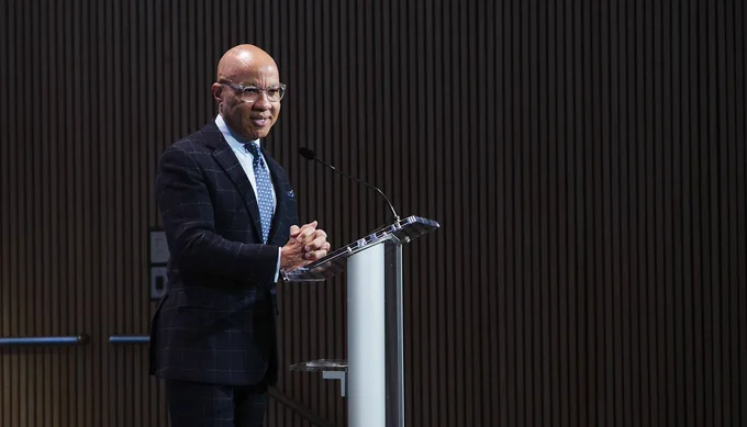 Darren Walker speaking on stage at Town & Country Philanthropy Summit
