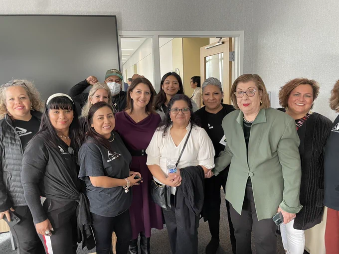 Dr. Cohen poses for a photo with partners at a vaccine clinic.