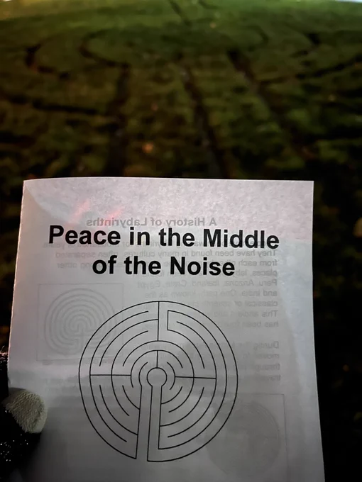 Labyrinth in background with flyer entitled “peace in the middle of the noise”.