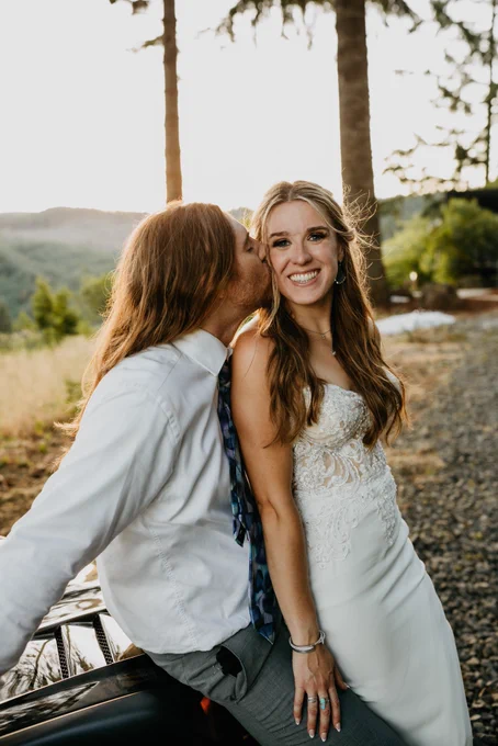 Groom kissing his bride