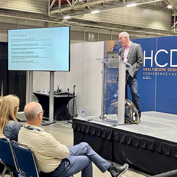 Seth Starner speaks to a crowded audience at Healthcare Design Conference.