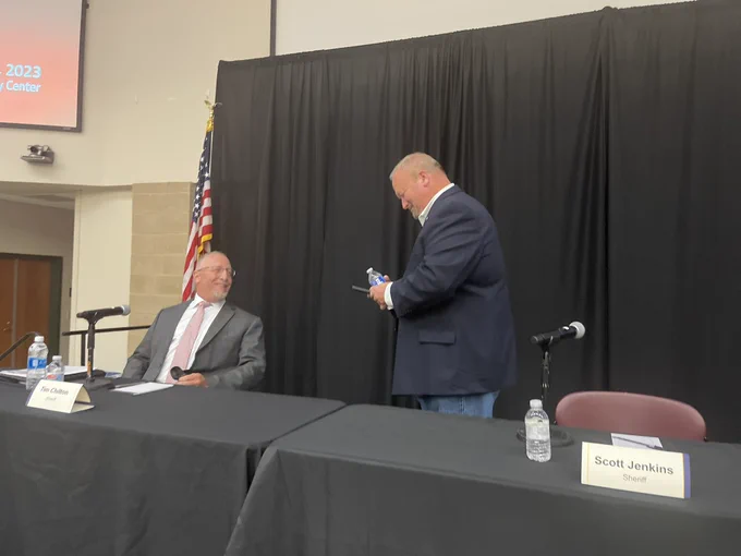 A photo from October of Sheriff Scott Jenkins, right, who was defeated for re-election on Tuesday by Tim Chilton, left.