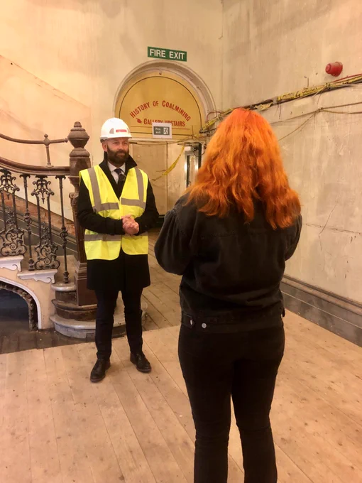 City Mayor Paul Dennett being interviewed by a BBC reporter inside Buile Hill Mansion.