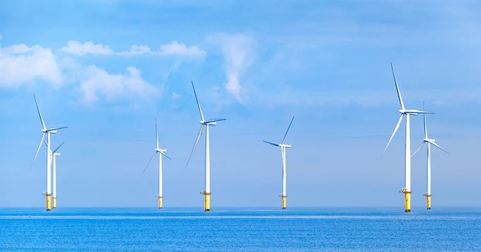 Photograph of an offshore wind farm.
