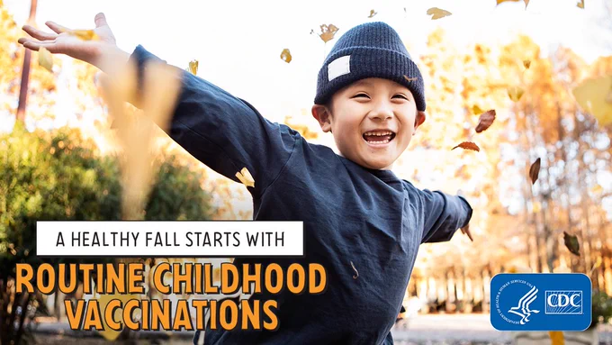 A child smiling as he throws leaves overhead outdoors with text that reads, “A healthy fall starts with routine childhood vaccinations.” The CDC logo is in the bottom right corner. 