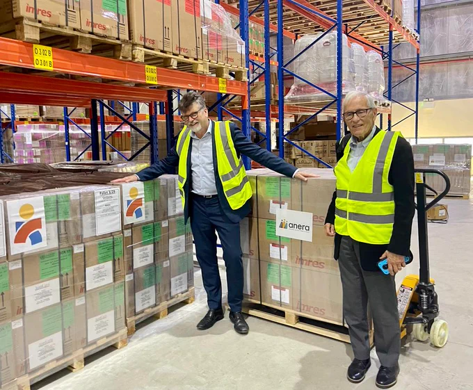 Anera President and CEO Sean Carroll (left) and Anera Board Chair Joe Saba at the Dubai warehouse where the shipment is being stored until it goes to Gaza. 