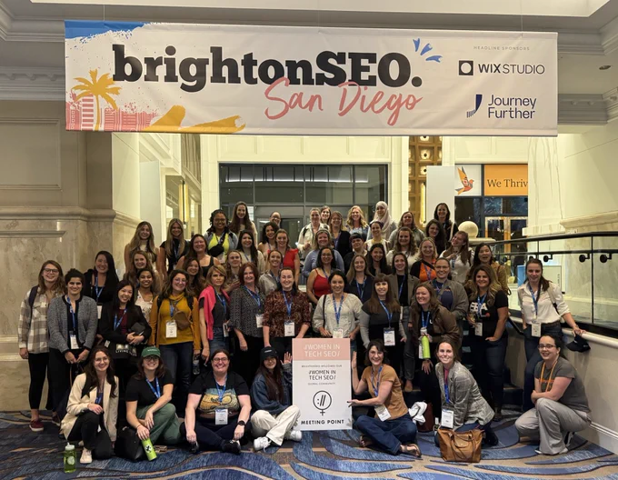 Photo of around 60 women gathered under a brightonSEO banner