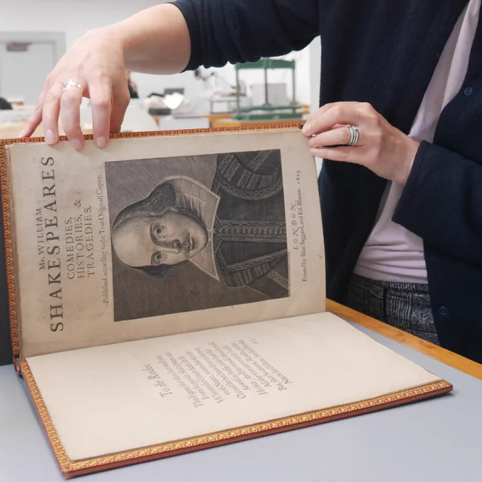 University librarian handling Shakespeare's First Folio