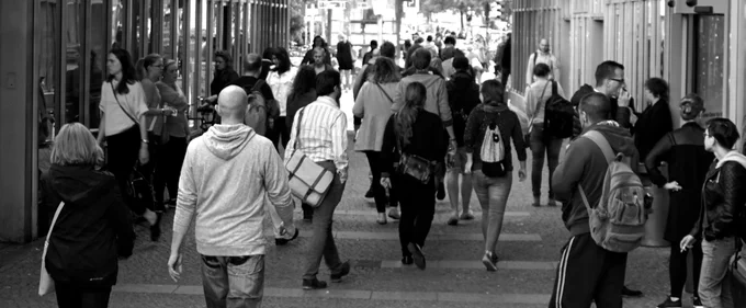 People walking down a busy street.