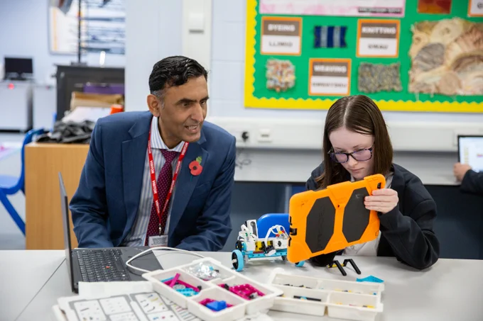 Professor Jas Pal Badyal FRS speaking to pupil
