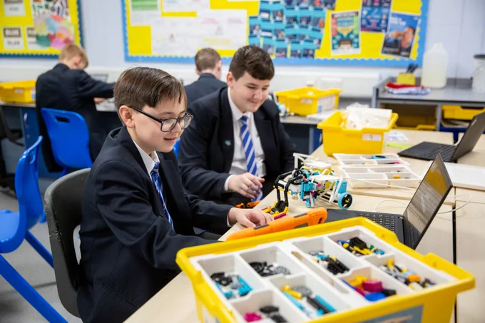 Two pupils working with lego