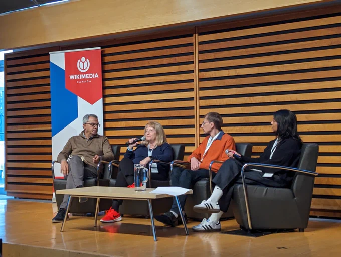 Wikimedia Foundation trustees Lorenzo Losa, Raju Narisetti, and Rosie Stephenson-Goodknight sit in a panel discussion.