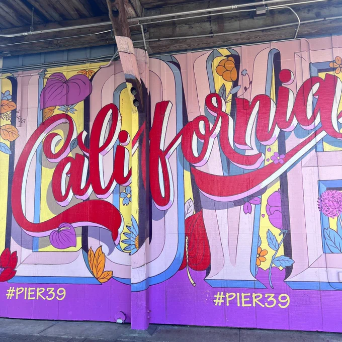 Photo of street art/mural that says "California love #PIER39"