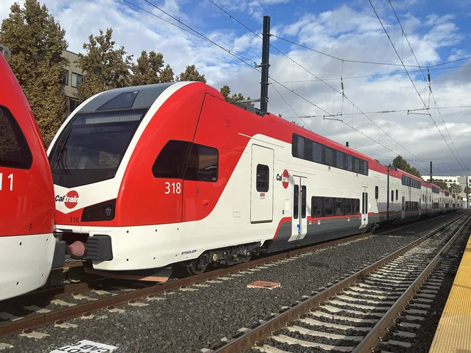 An electric train, paint scheme white and red