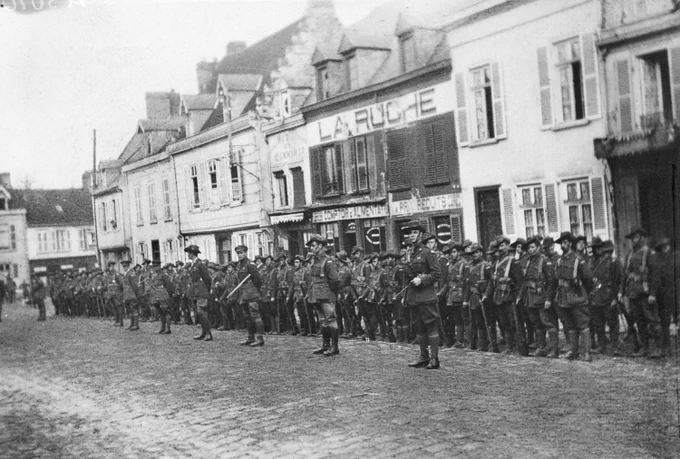 Members of the 16th Battalion, on parade in the town of Picquigny on Armistice Day, 11 November 1918. A03070