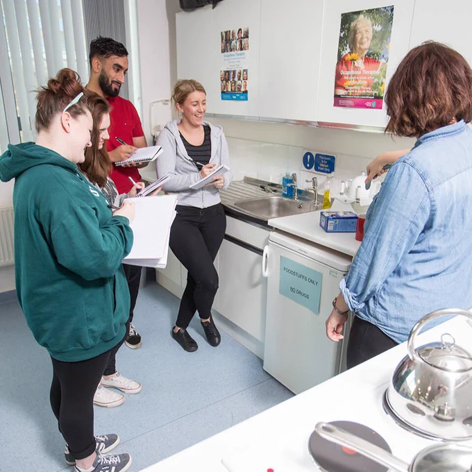 A group of occupational therapy students at work.