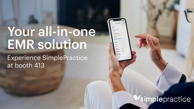 a person holding a cell phone
Text: Your all-in-one EMR solution
Experience SimplePractice at booth 413