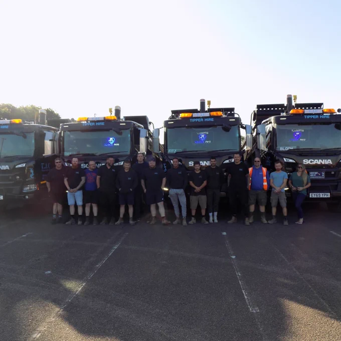 The team at Tjcottis Transport Infront of our Scania Fleet, proudly serving the community of Essex for the last 20 years. 