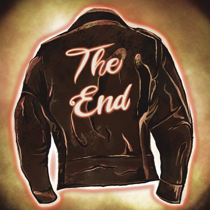 The back of a leather jacket surrounded by gold with the words "The End" writing across its middle in script.