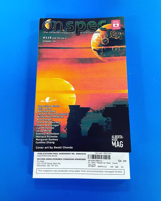 Issue #119 of On Spec Magazine lays on top of a blue background.