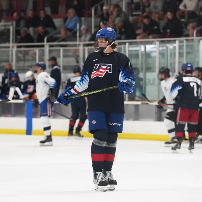 Team Blue player on the ice 