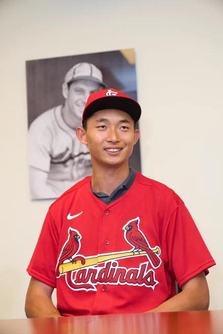 Chen-Wei Lin smiles while wearing his St. Louis Cardinals uniform