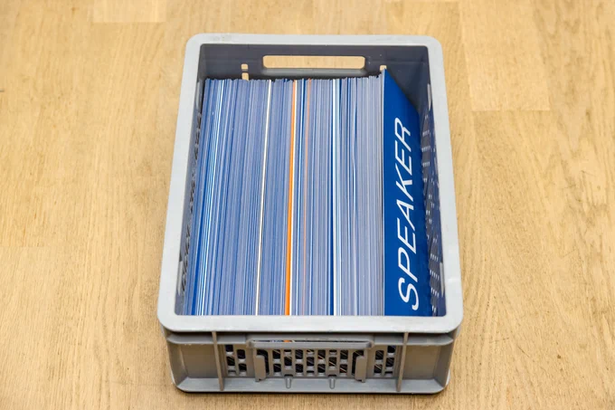 A box of nameplates for delegations represented at the WIPO Assemblies. In view is one reading “SPEAKER”.