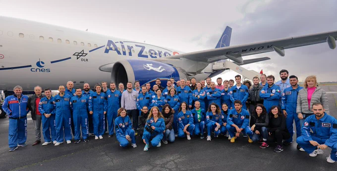 University students and flight crew in front of an AirZeroG aircraft, as part of ESA Academy Experiments Programme