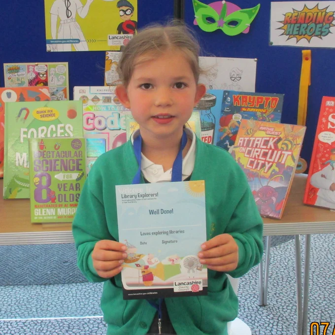 child holding a certificate
