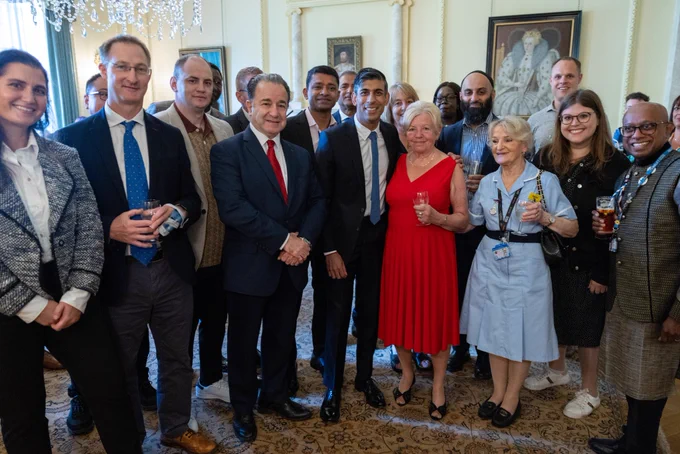 Prime Minister Rishi Sunak attends an NHS 75th Birthday reception in Downing Street and stands for group photo. 