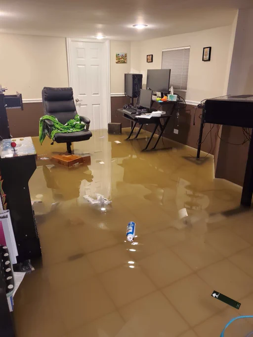 A photo of Hemlock Creek Production's office full of muddy water