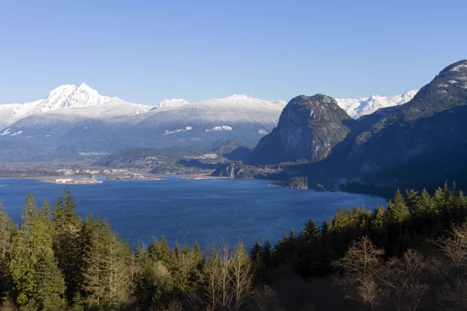  Mount Garibaldi located in British Columbia, with a lake at the ground level.