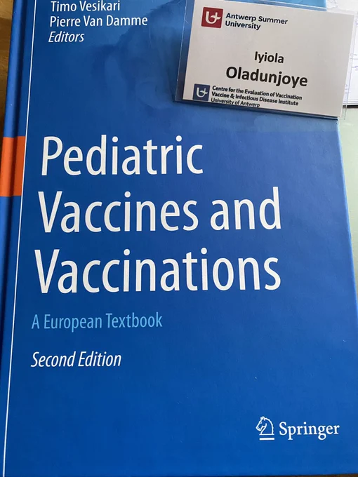 Summer School on Vaccinology tag and an European book on Vaccination received from Prof Pierre Van Damme at the inception of the programme.