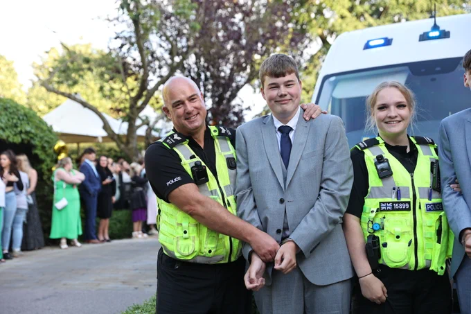 William Barlow pictured with officers from Derbyshire Constabulary 