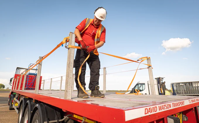 Bradley, from David Watson Transport, setting up the trailer for media & press.