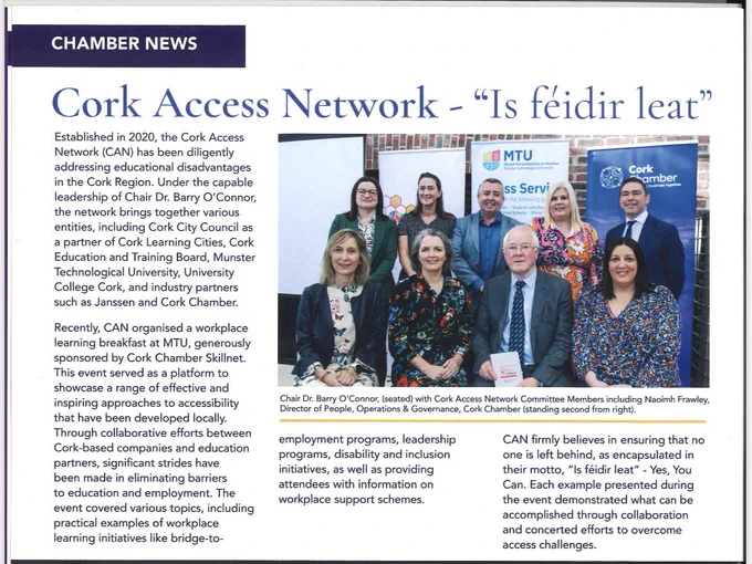 News article with photo on right of group of 9 people sitting and standing all looking at camera.